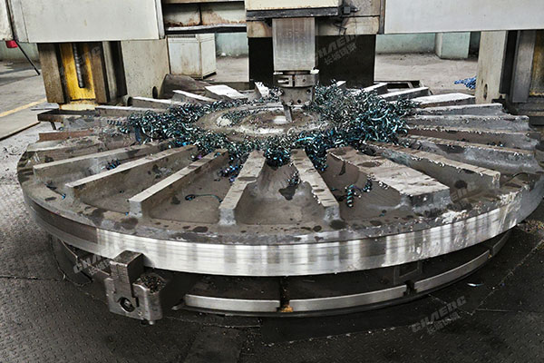 When choosing materials for large castings, is it better to use cast steel or cast iron?